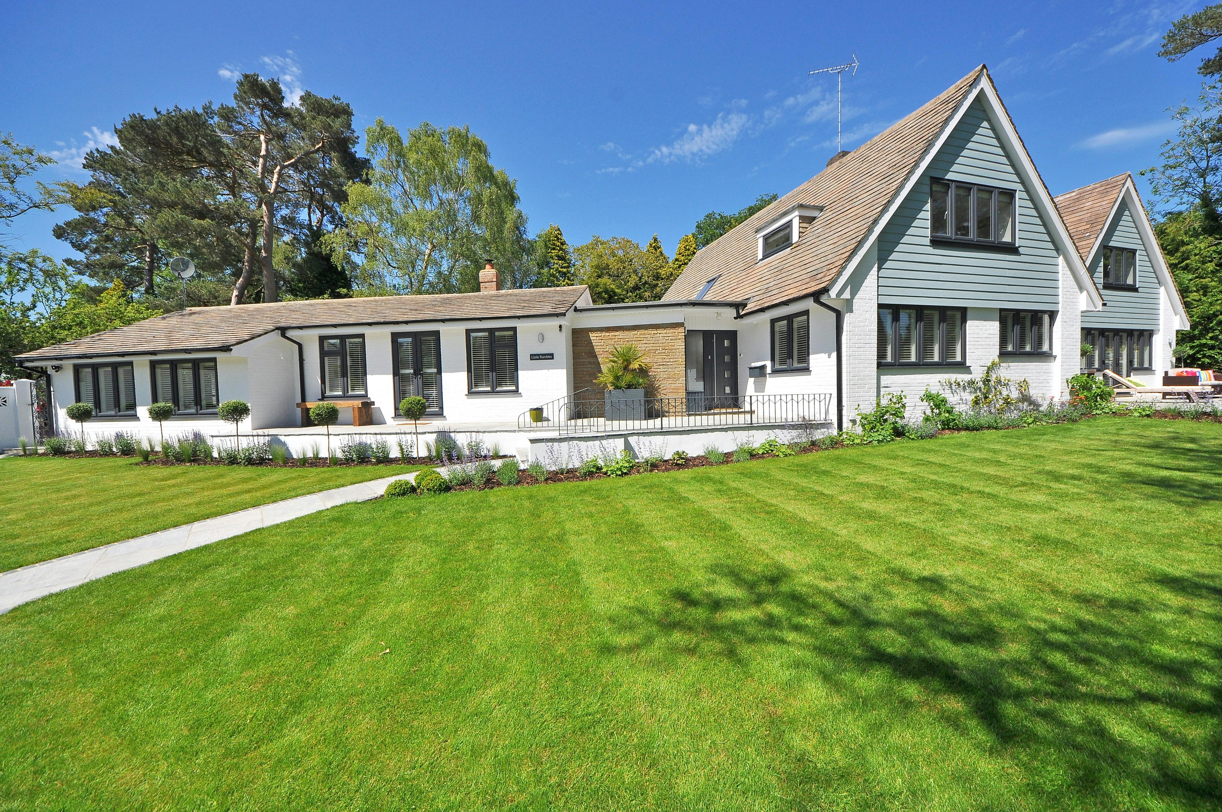 Contemporary house with geometric design and large windows